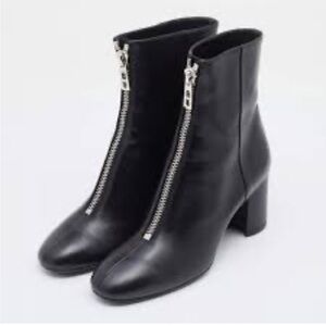 Hermes “New York 70” Black Leather Ankle Boots with Front Zipper Detail